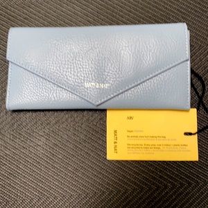 Matt and Nat vegan wallet.  Sky blue. Holds 12 cards. Zipper in back.